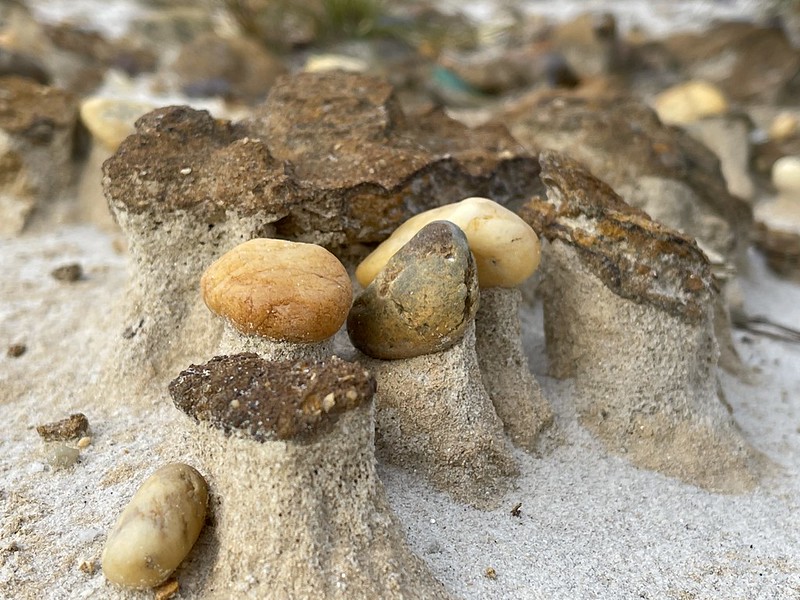 Stones on sand